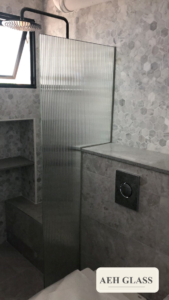 Fluted laminated shower panel