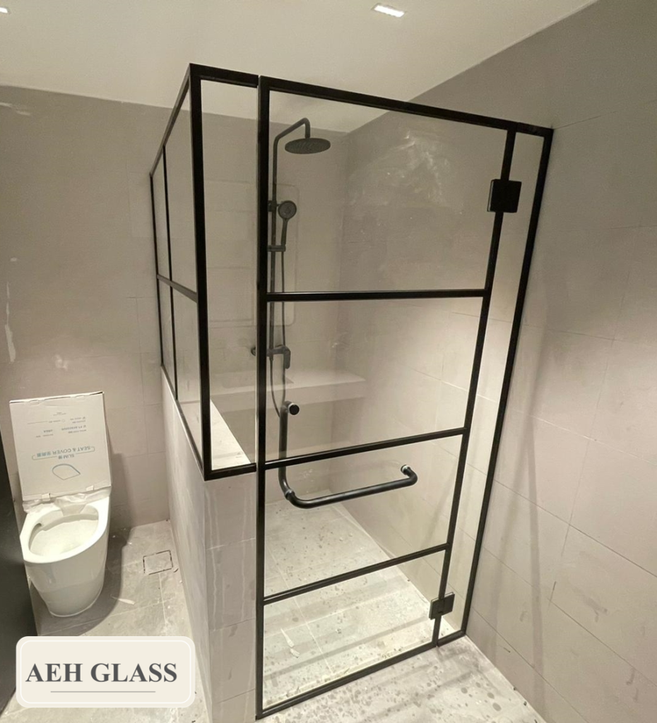 Shower screen with black frame and lattice design